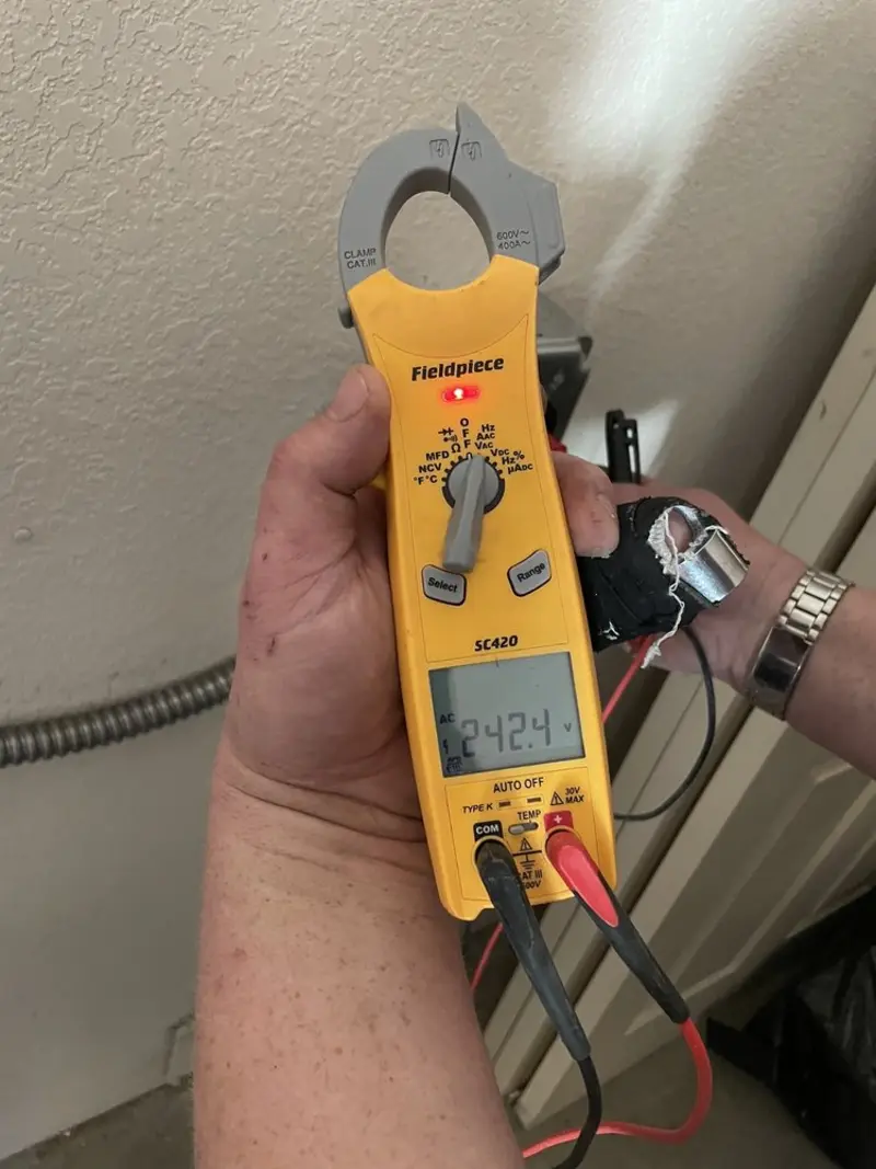 Voltage testing with clamp meter during Generator Installation in East Lake